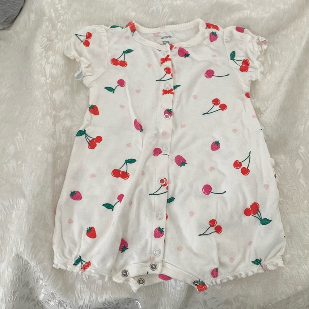 Carters white summer jumper with strawberries and cherries on it.